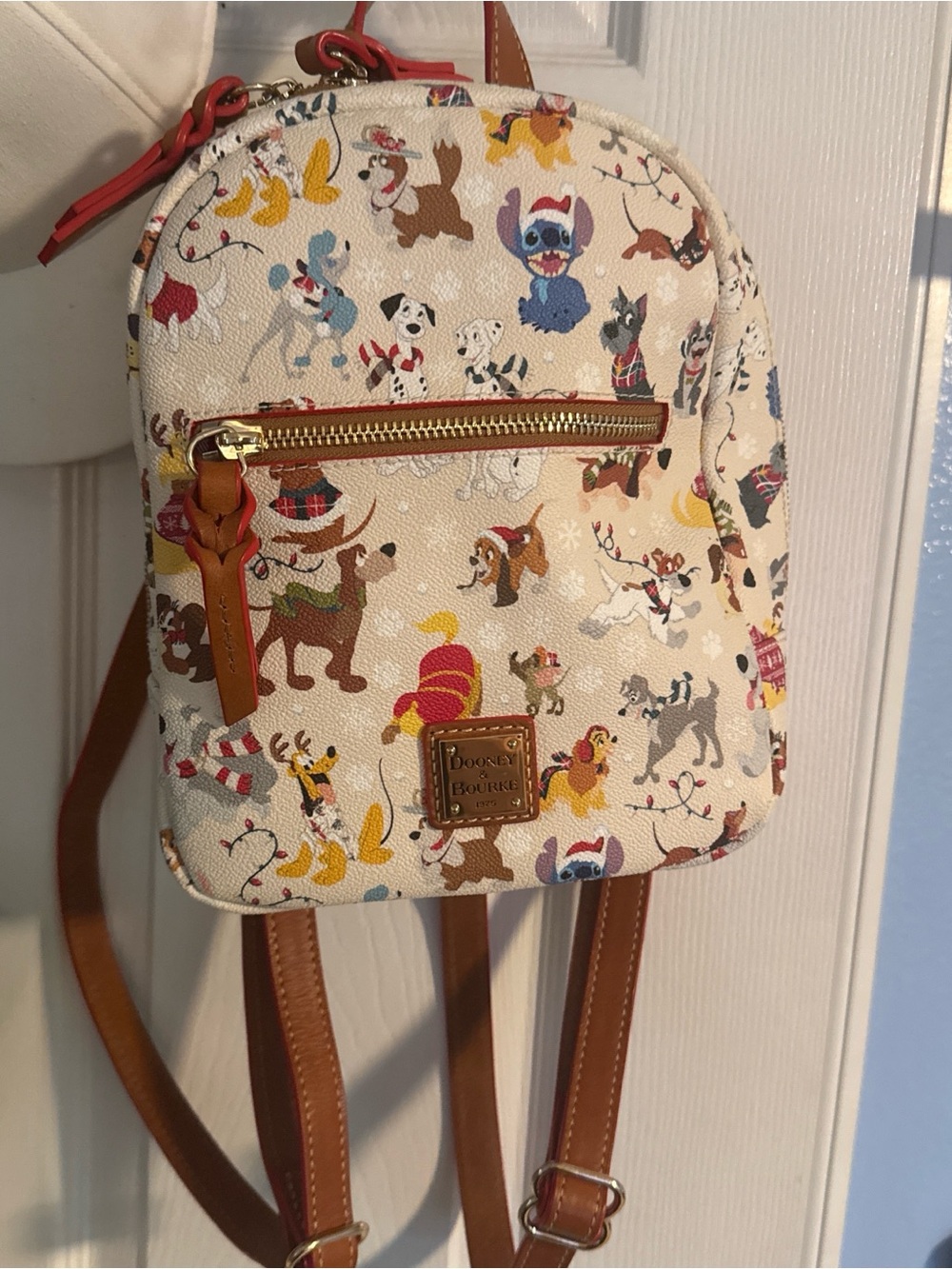 Dooney & Bourke Cream Mini Backpack with Colorful Disney Dog Print